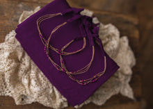 limited-edition "dark orchid" boho band