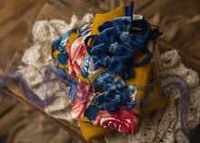 limited-edition "Sapphire" velvet bow OR "Abagail" DreamSoft wrap OR backdrop ($20/22/15/40)