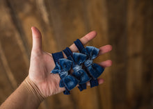 limited-edition "Sapphire" velvet bow OR "Abagail" DreamSoft wrap OR backdrop ($20/22/15/40)