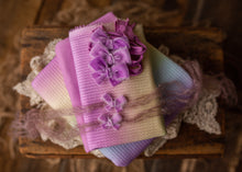limited-edition "orchid" velvet bow OR wrap OR backdrop ($20/22/16/42)